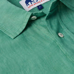 Men's Riviera Green Abaco Linen Shirt close-up showing collar, buttons, and Love Brand & Co. label. One of our old money shirts crafted from 100% linen.