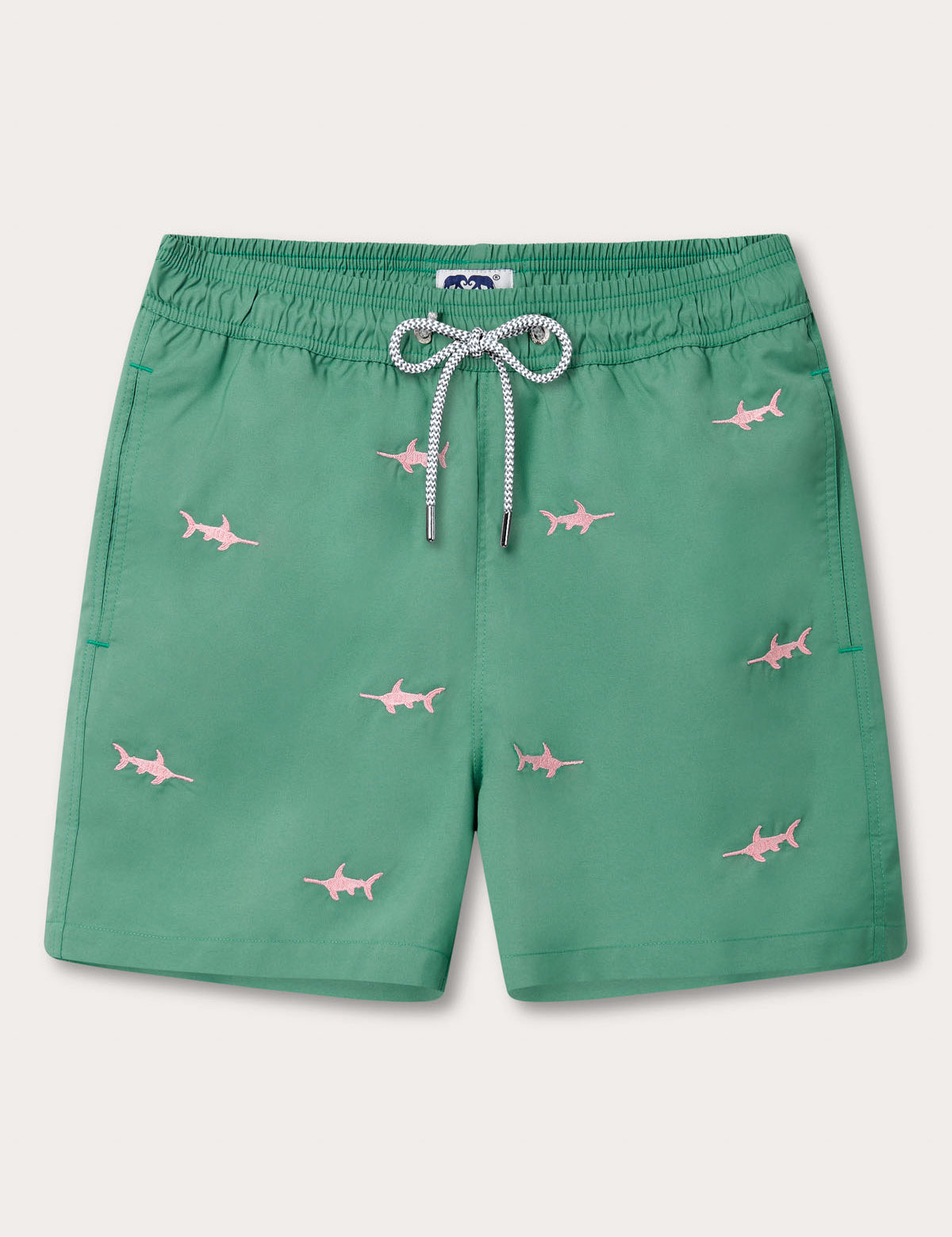 Men's Staniel Swim Shorts with pink swordfish motifs on green fabric.