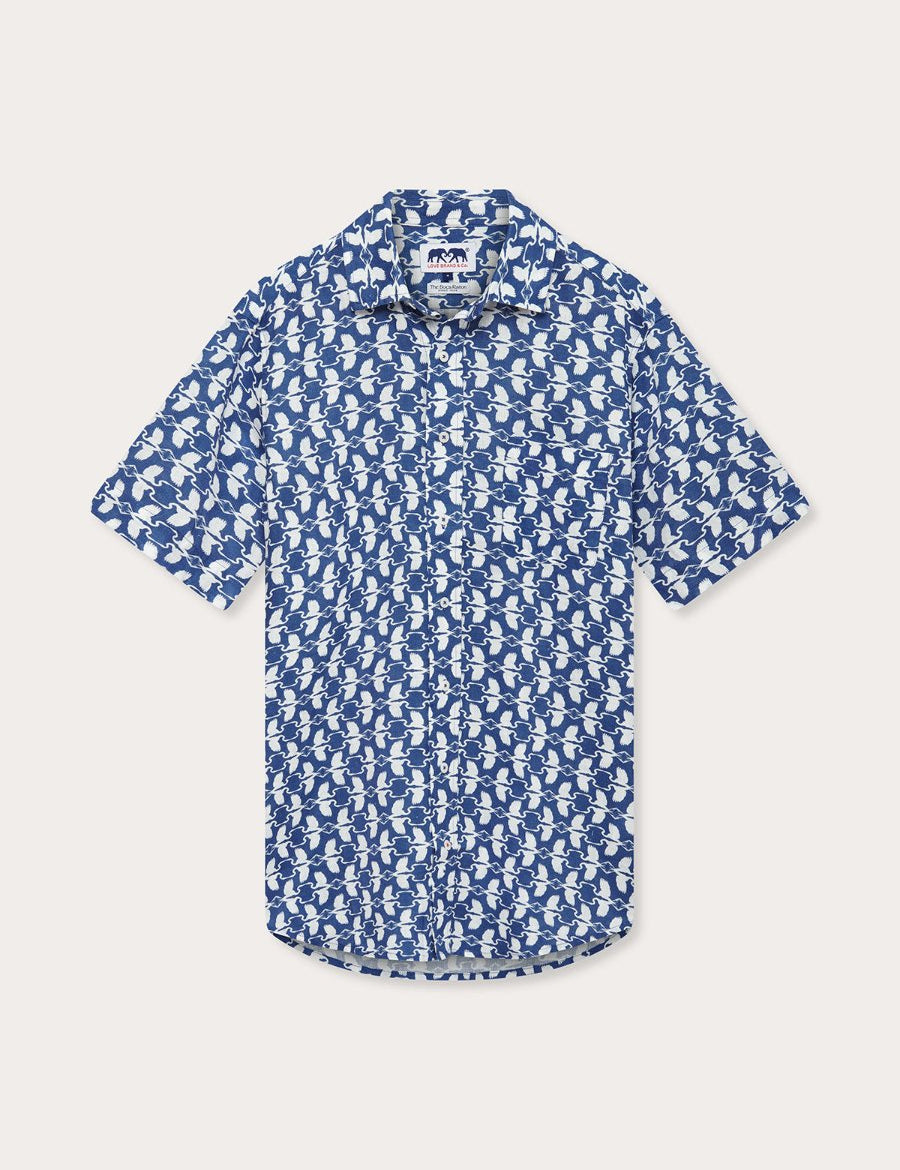 Men's White Heron Manjack Linen Shirt with blue and white heron print, short-sleeved, button-up design.