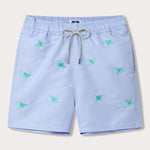 Men's light blue swim shorts featuring embroidered turquoise manta rays, made from 100% recycled, quick-dry fabric.