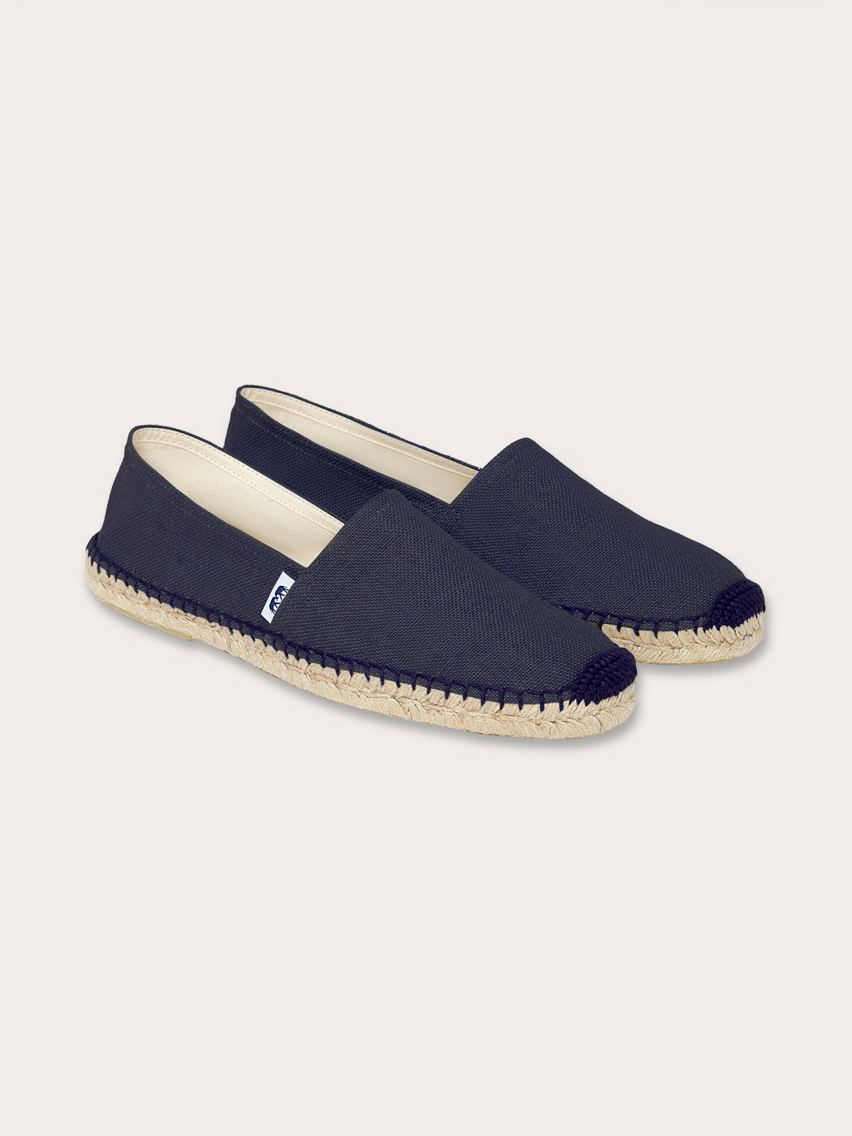 Navy Blue espadrilles made from 100% cotton canvas with beige stitching and sole.