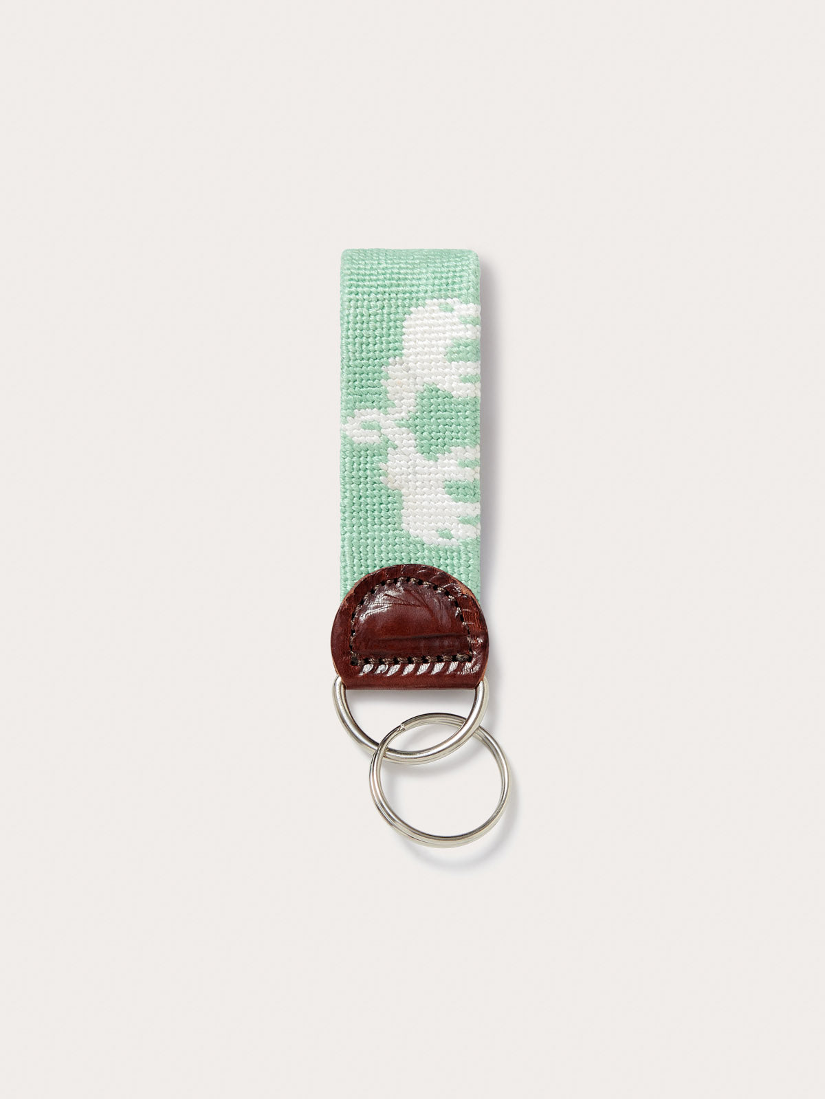 Love Brand green key chain featuring elephant palace needlepoint design. Green keyring made from genuine leather.