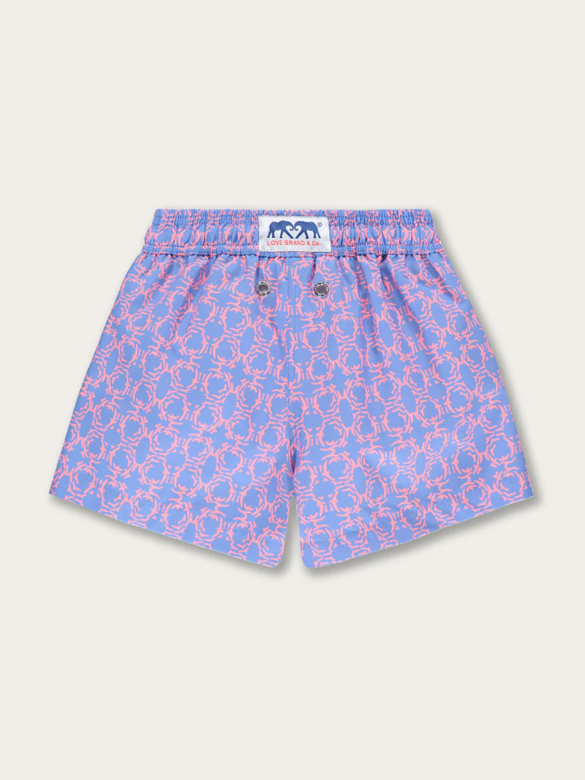 Boys Omotion Staniel Swim Shorts featuring a geometric print inspired by coral reefs in the Bahamas.