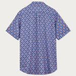 Men's Palm Paradise Arawak Linen Shirt in blue with pink Monstera leaf pattern. Men's linen shirt with short sleeves and sustainably made with 100% natural linen.