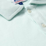 Close-up of the Men's Sea Air Pensacola Polo Shirt in pastel hue, featuring breathable cotton fabric and button details.