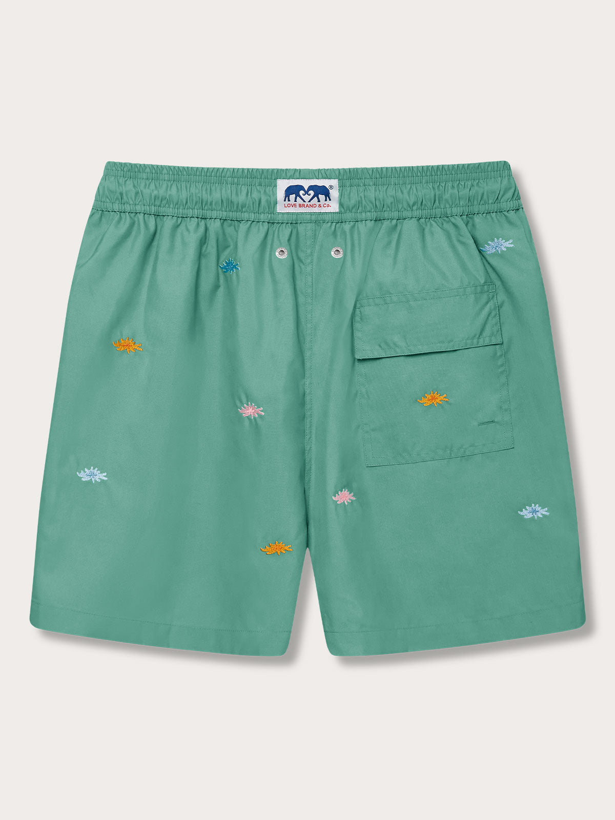 Men's Primavera Embroidered Staniel Swim Shorts with sea flower embroidery on a Riviera green base. Embroidered swim shorts featuring an elastic waistband and back pocket, displayed against a neutral background.