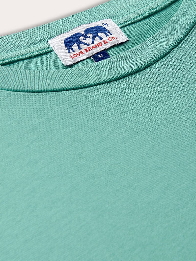 Men's Riviera Green Lockhart T Shirt made with 100% cotton, featuring bold green color and Love Brand & Co. label on the neckline.