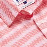 Close-up view of Love Brand & Co. Mens Roseate Spoonbill Manjack Linen Shirt. Pink men's linen shirt featuring bird pattern in an old money style.