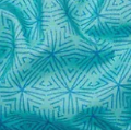 Teal fabric with geometric pattern