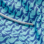 Men's Seahorses and Orcas Staniel Swim Shorts featuring a detailed marine life print with aqua green seahorses and deep blue orcas, quick-dry fabric, and a braided drawstring.