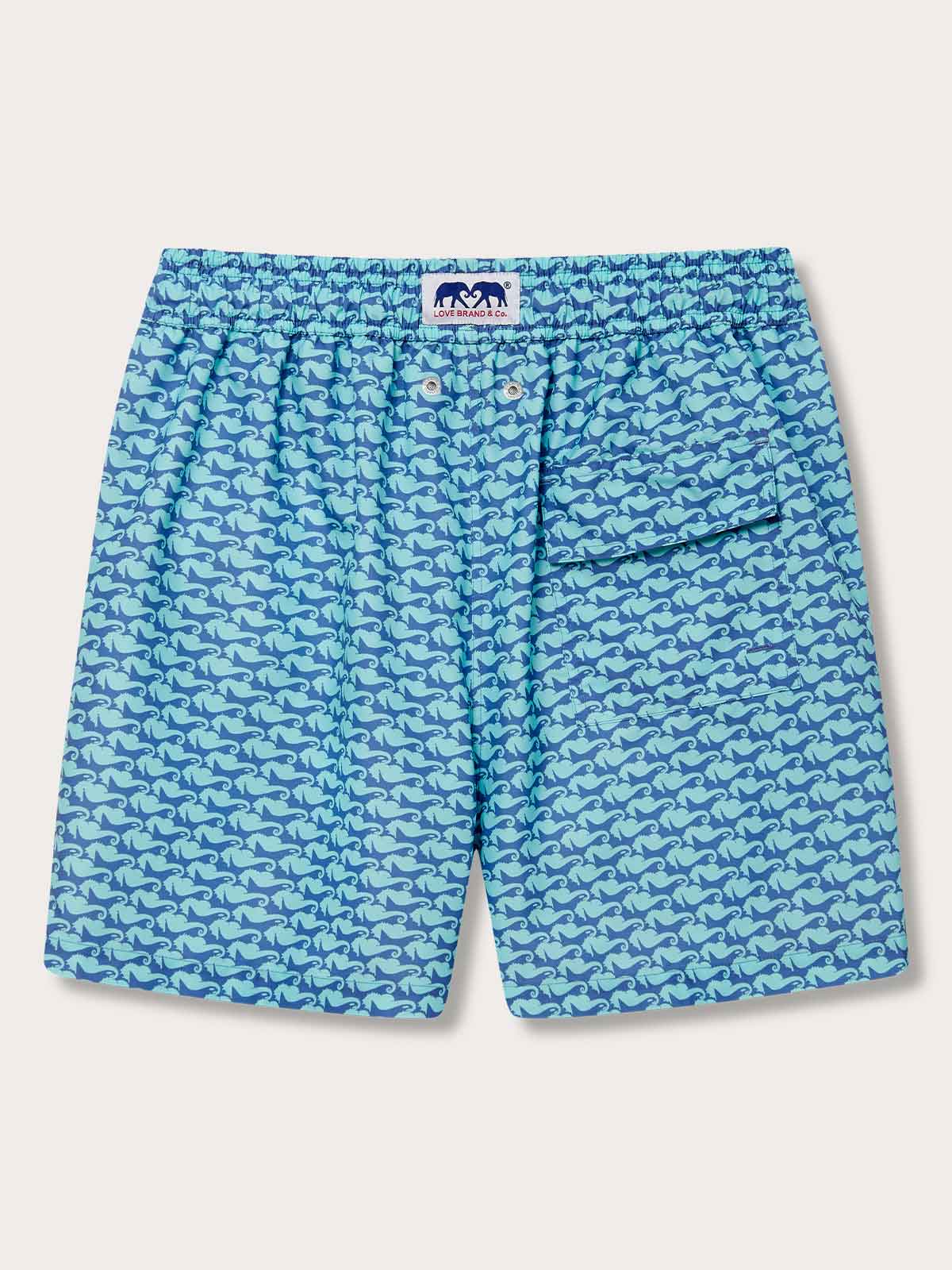 Men's swim shorts featuring a pattern of orcas and seahorses in shades of blue and aqua green, made from quick-dry, 100% recycled fabric.