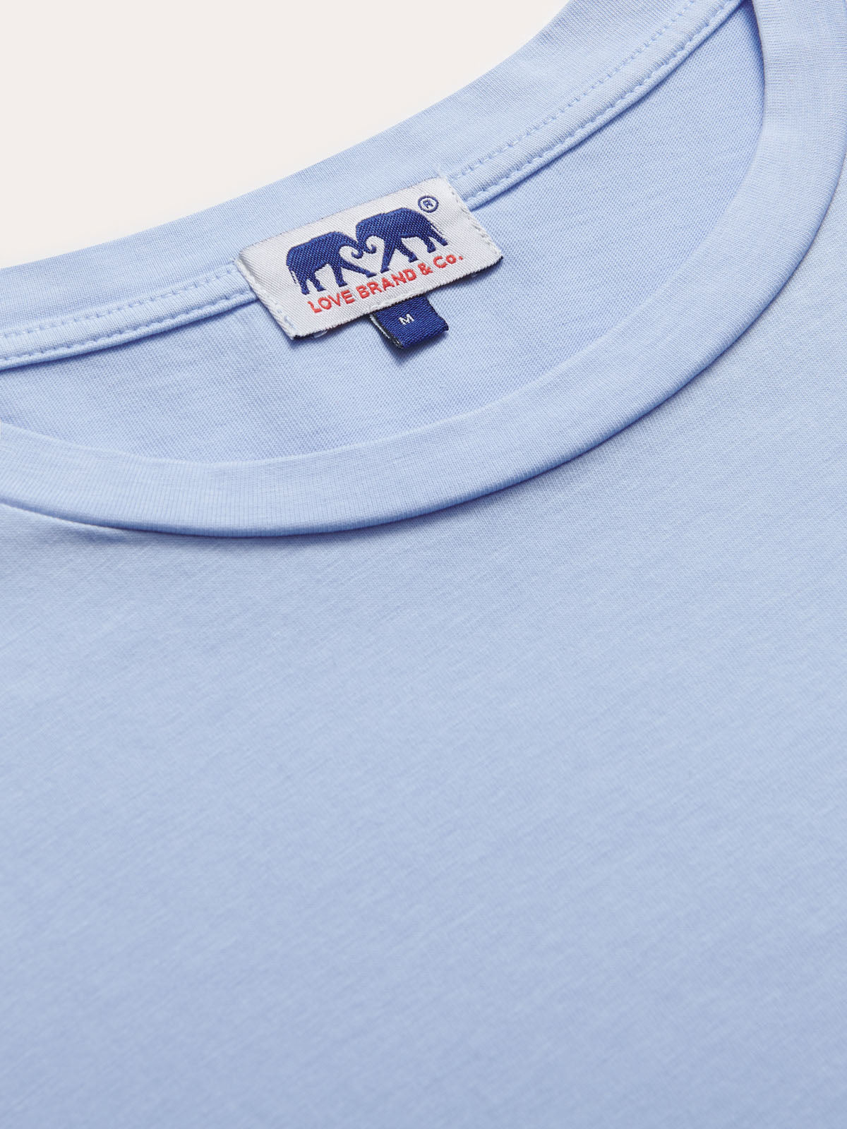 Men's Sky Blue Lockhart T-Shirt, close-up of fabric and neckline with brand tag.