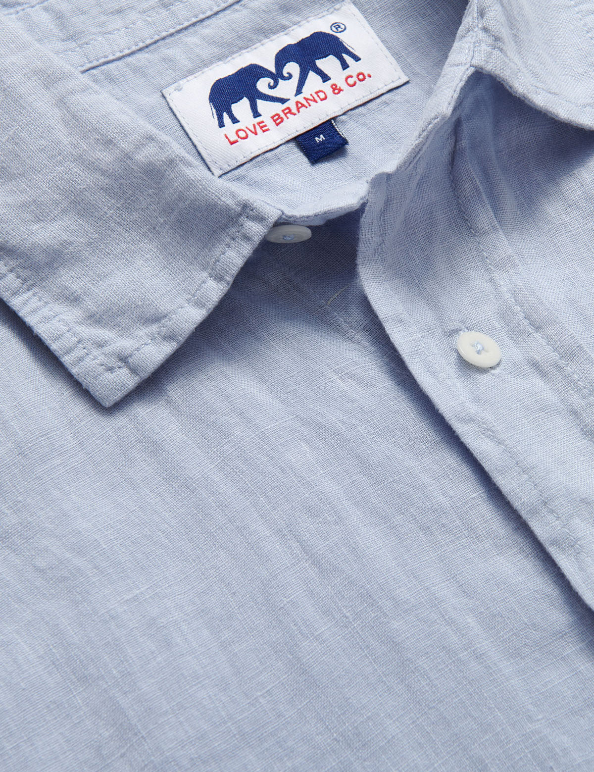 Sky Blue mens Linen Shirt detailed view showcasing love brand label.