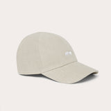 Lightweight linen baseball cap with embroidered logo for a stylish and comfortable outdoor look.