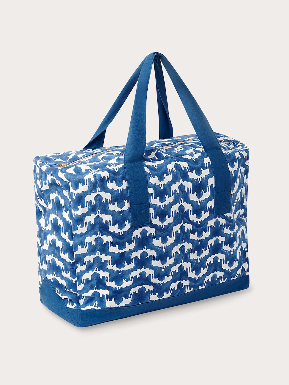 Side view of large elephant palace shopping bag in blue and white