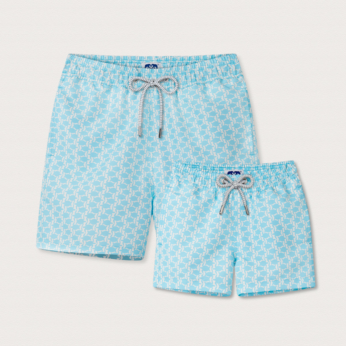 blue swim shorts with a turtle pattern