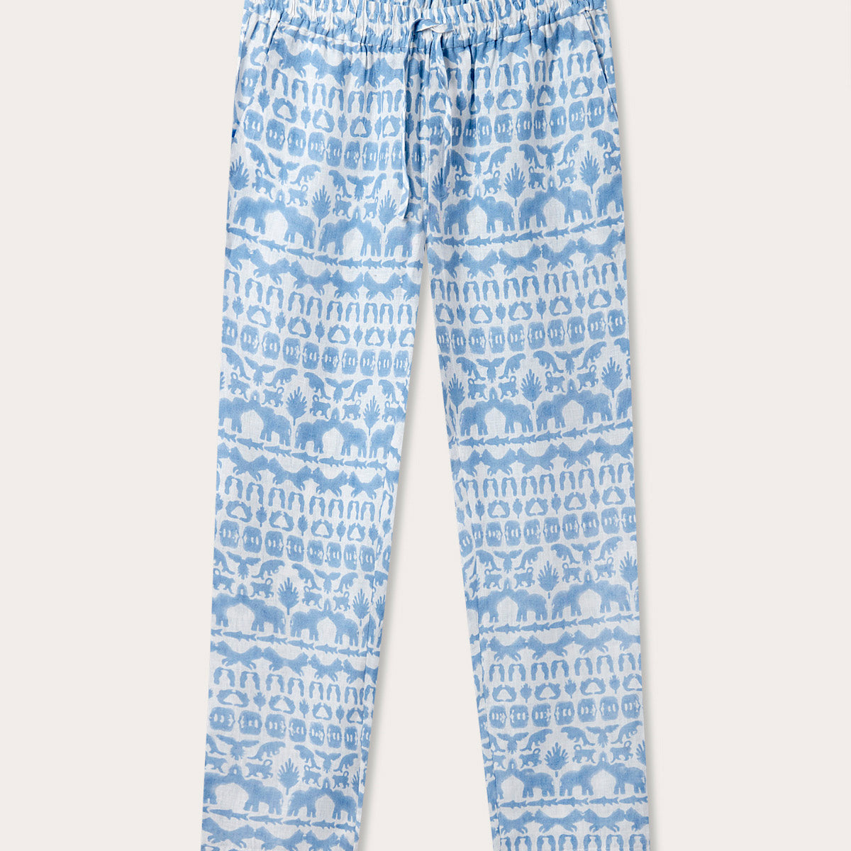 Unisex Eleuthera Trousers - Coexist featuring sky blue Coexist print with animals of the Indian jungles. Unisex linen pants crafted from 100% premium Belgian linen with an elastic waist and drawstring.