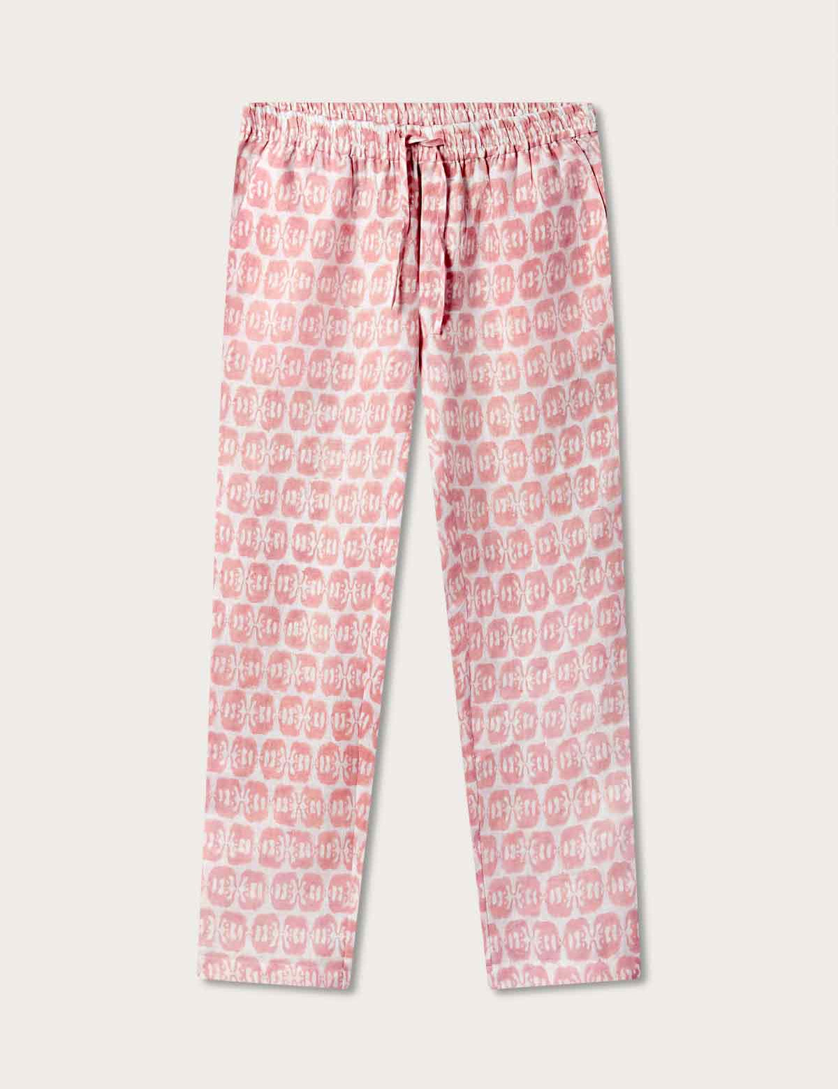 Pink linen trousers featuring love brand & co elephants of india print. Front view of drawstring trousers showing elastic waist, perfect for old money styling.