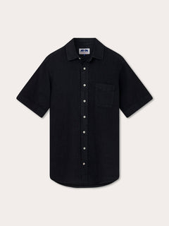 A mens black short sleeve linen shirt with a relaxed fit, perfect for summer.