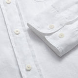 Men's White Andros Hemp Shirt with pleated double chest pockets and signature corozo nut buttons, made from 100% organic hemp for strength and comfort.