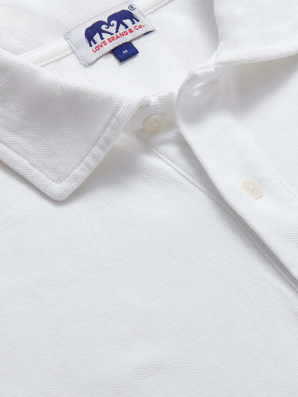 Men's White Pensacola Polo Shirt with Collar Detail and Buttons.