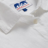 Detailed view of Womens White Inagua Linen Shirt. Long-sleeved button-up plain linen shirt with front pocket.