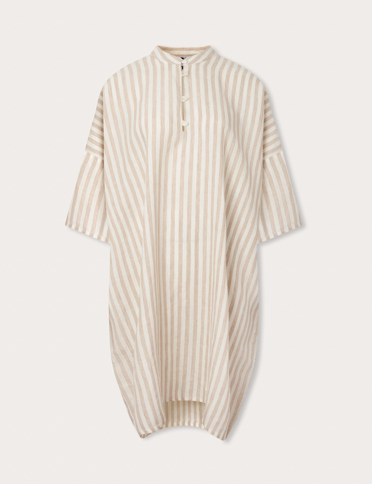 Womens Coconut Stripe Jumento Linen Poncho front view. brown and white striped pattern on short sleeved, half-button up shirt dress poncho. 