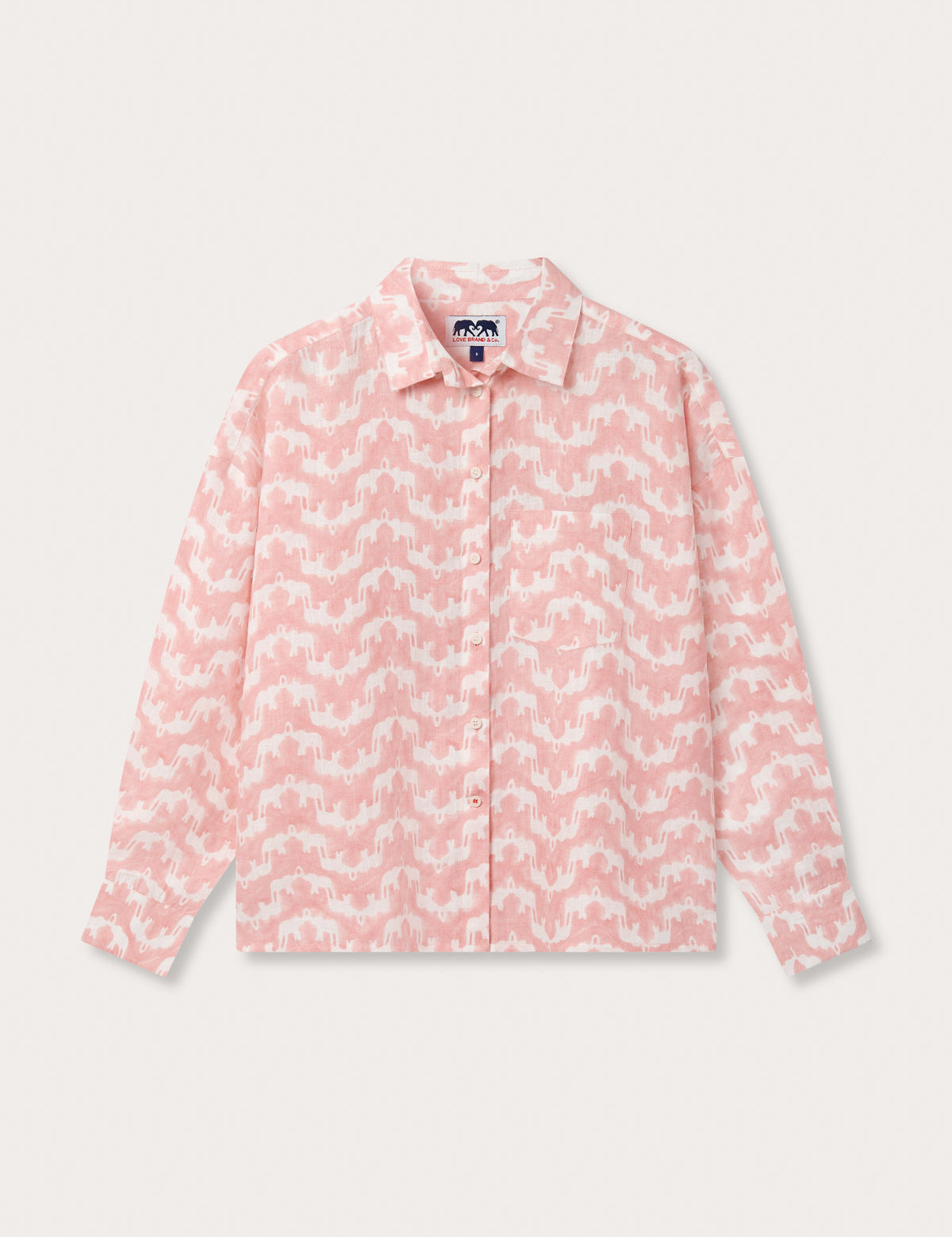 Our Womens Elephant Palace Strawberry Inagua Linen Shirt. Pink and white linen shirt with a handy front pocket. Long-sleeved shirt with a button-up design, finished with an elephant print.