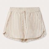 front view of Womens Coconut Stripe Musha Linen Shorts. Brown and white linen shorts with a drawstring tie and elastic waist.