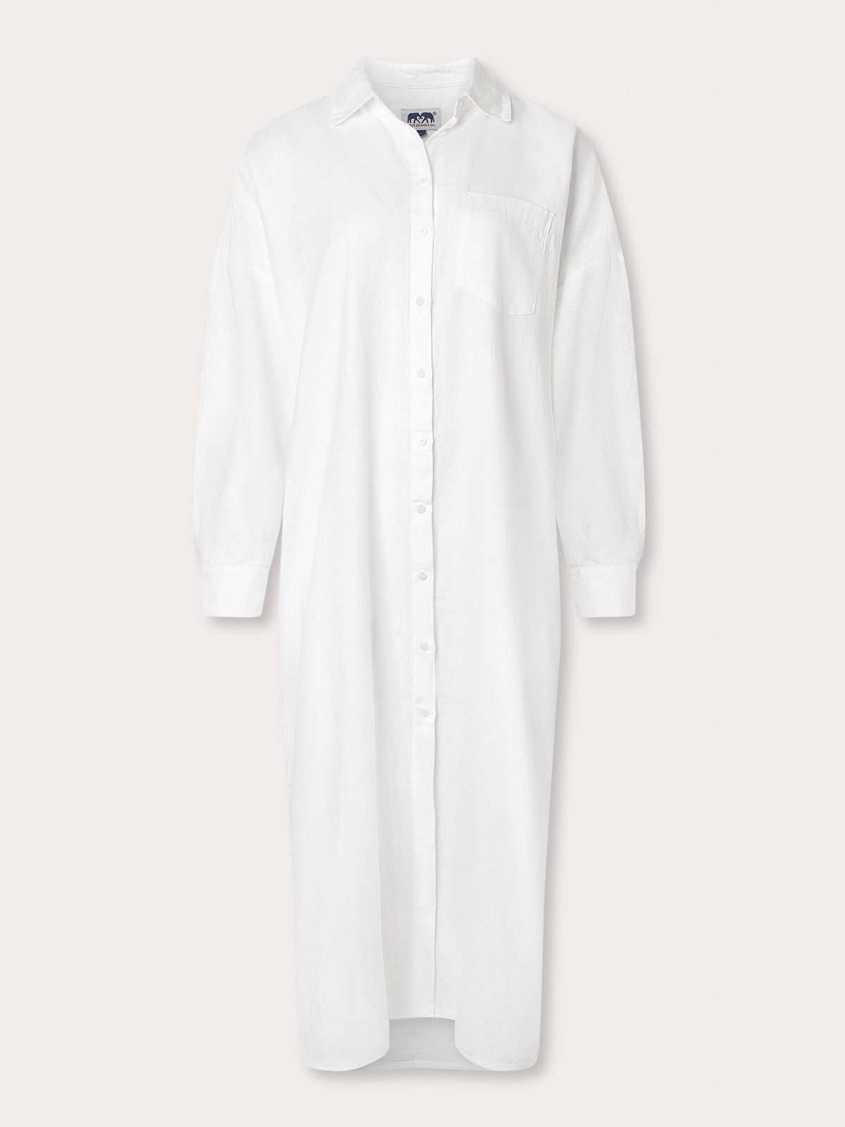 Front view of Womens White Sapodilla Linen Shirt Dress. Long sleeve, button-up midaxi dress with front pocket made from 100% linen.