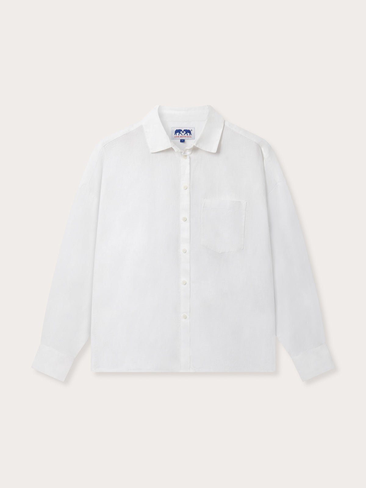 Womens White Inagua Linen Shirt. Long-sleeved button-up plain linen shirt with front pocket.