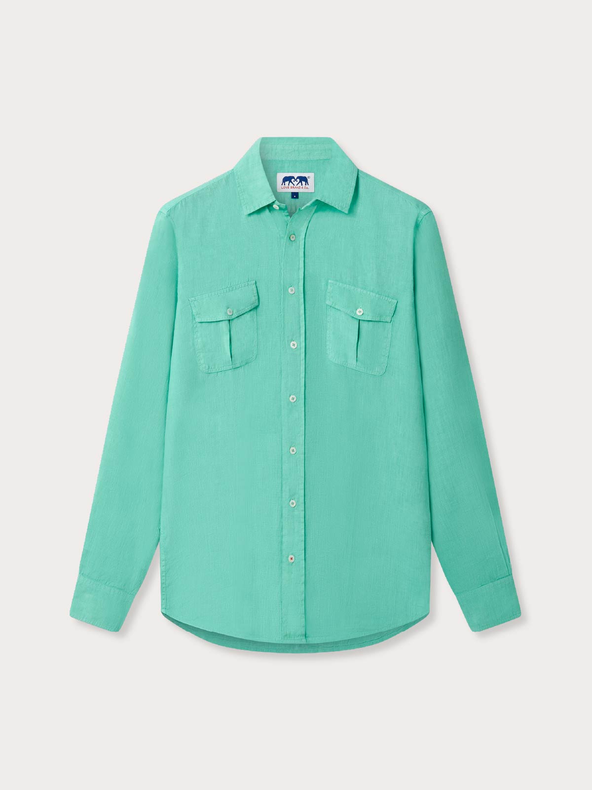 Green shirt with two breast pockets, a button-up design and long sleeves.