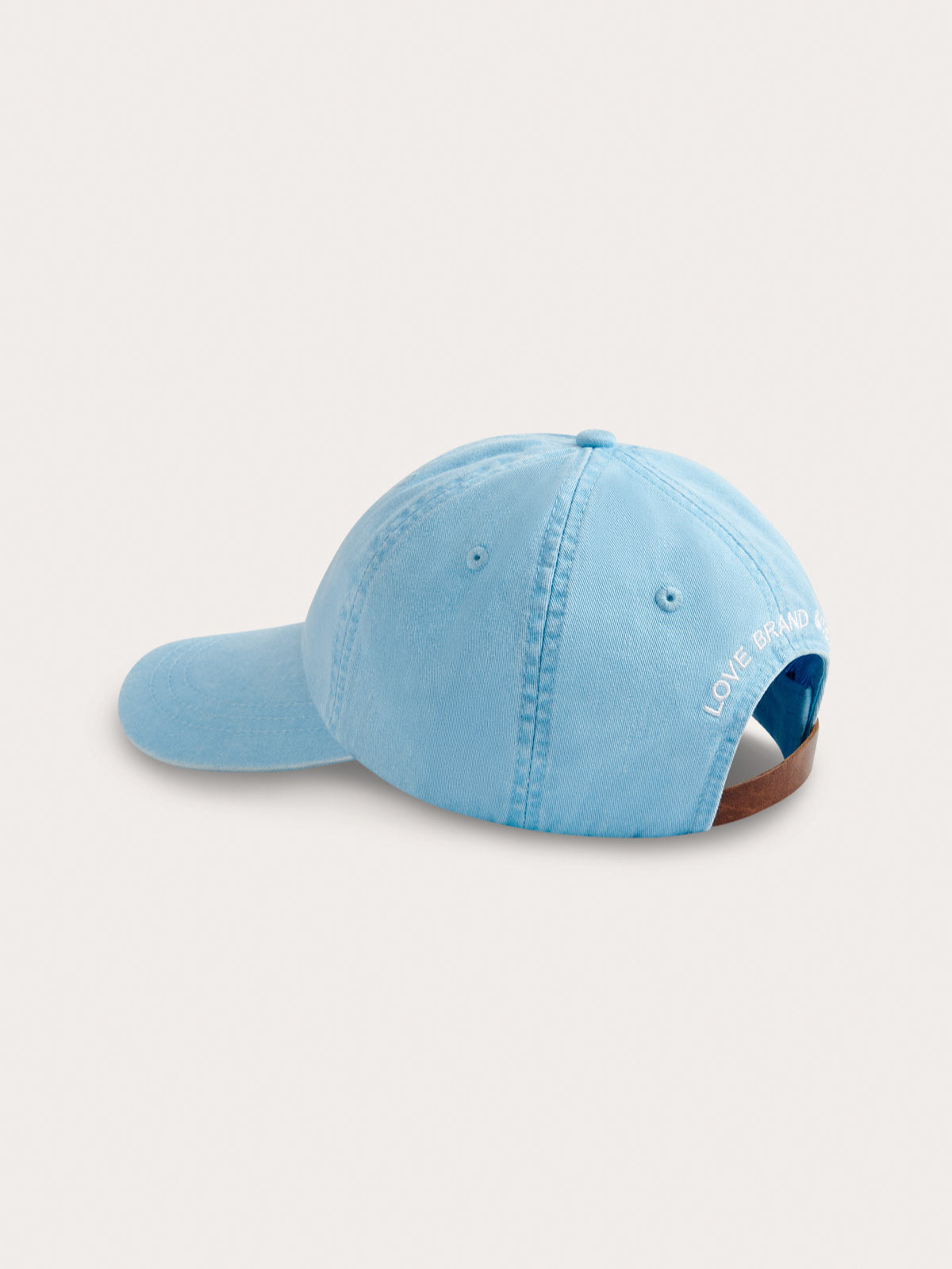 Back view of sky blue baseball cap by love brand.