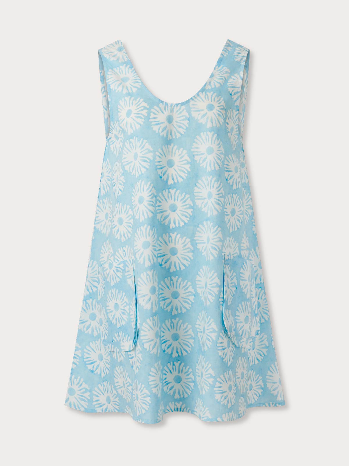 Light blue scoop back dress with white floral pattern on a white background.