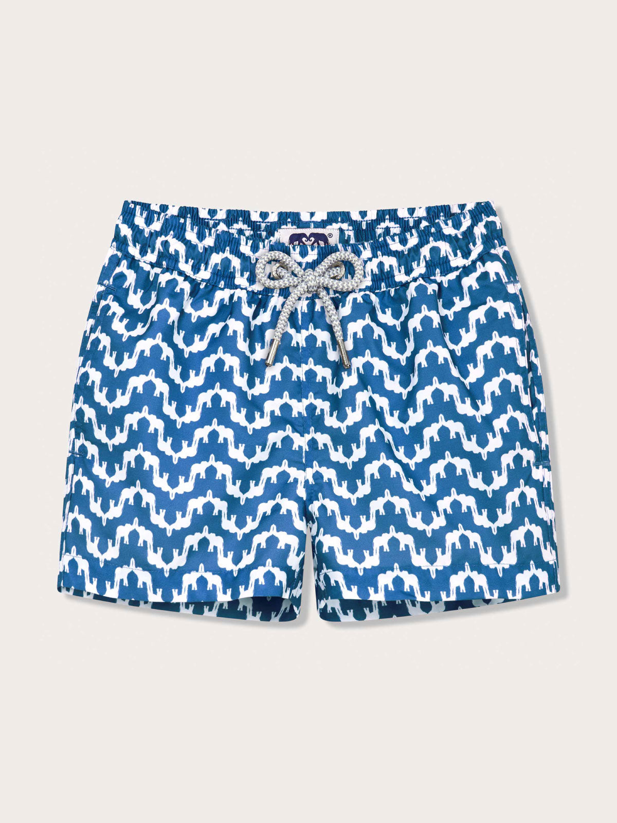 Front view of Boys Elephant Palace Blue Staniel Swim Shorts. Elephant swim shorts for children featuring drawstring waist and 2 pockets.