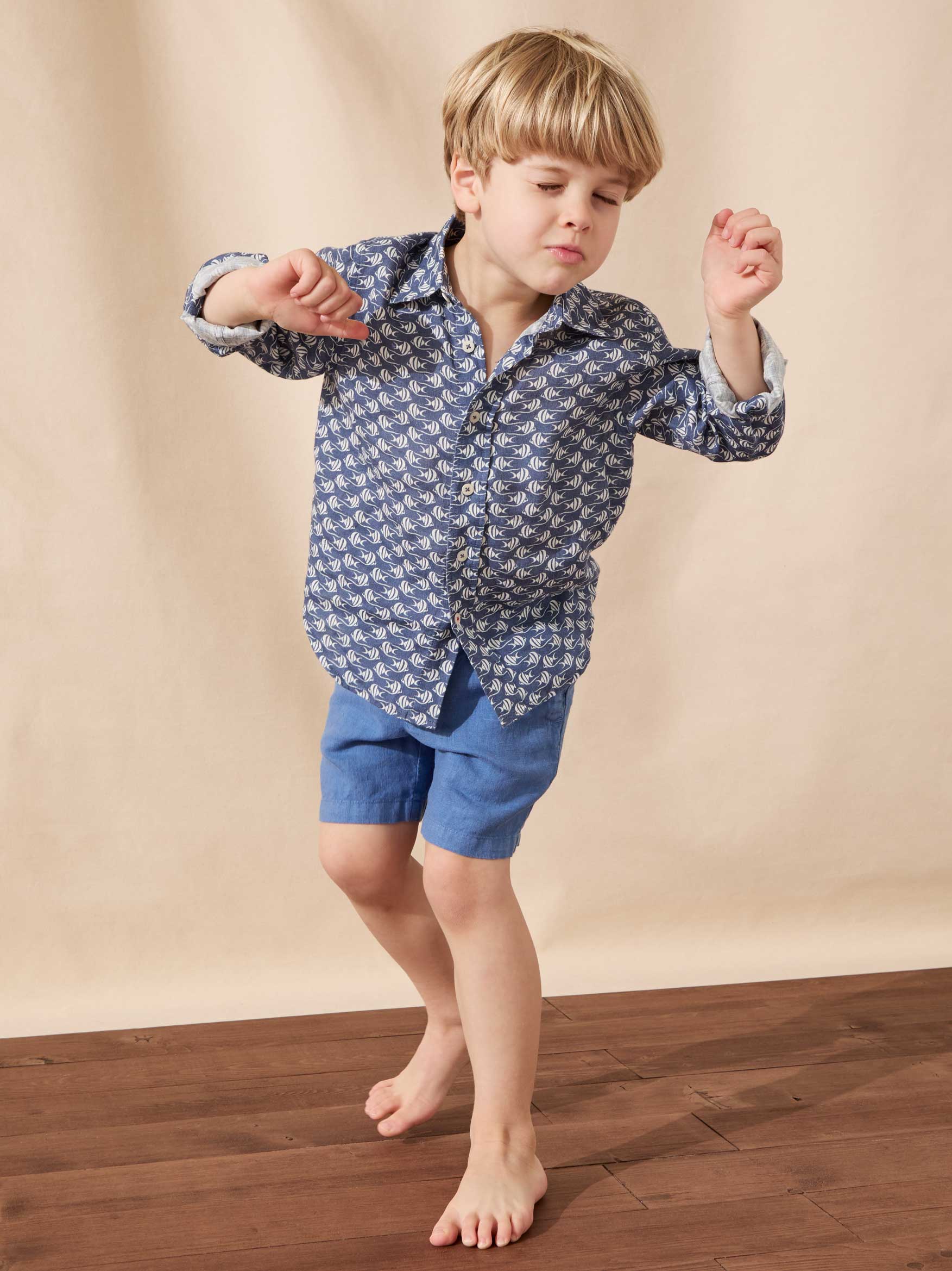 childrens beach wear range including plain polos and t-shirts