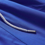 Close-up view of Boys Majorelle Blue Staniel Swim Shorts with drawstring.