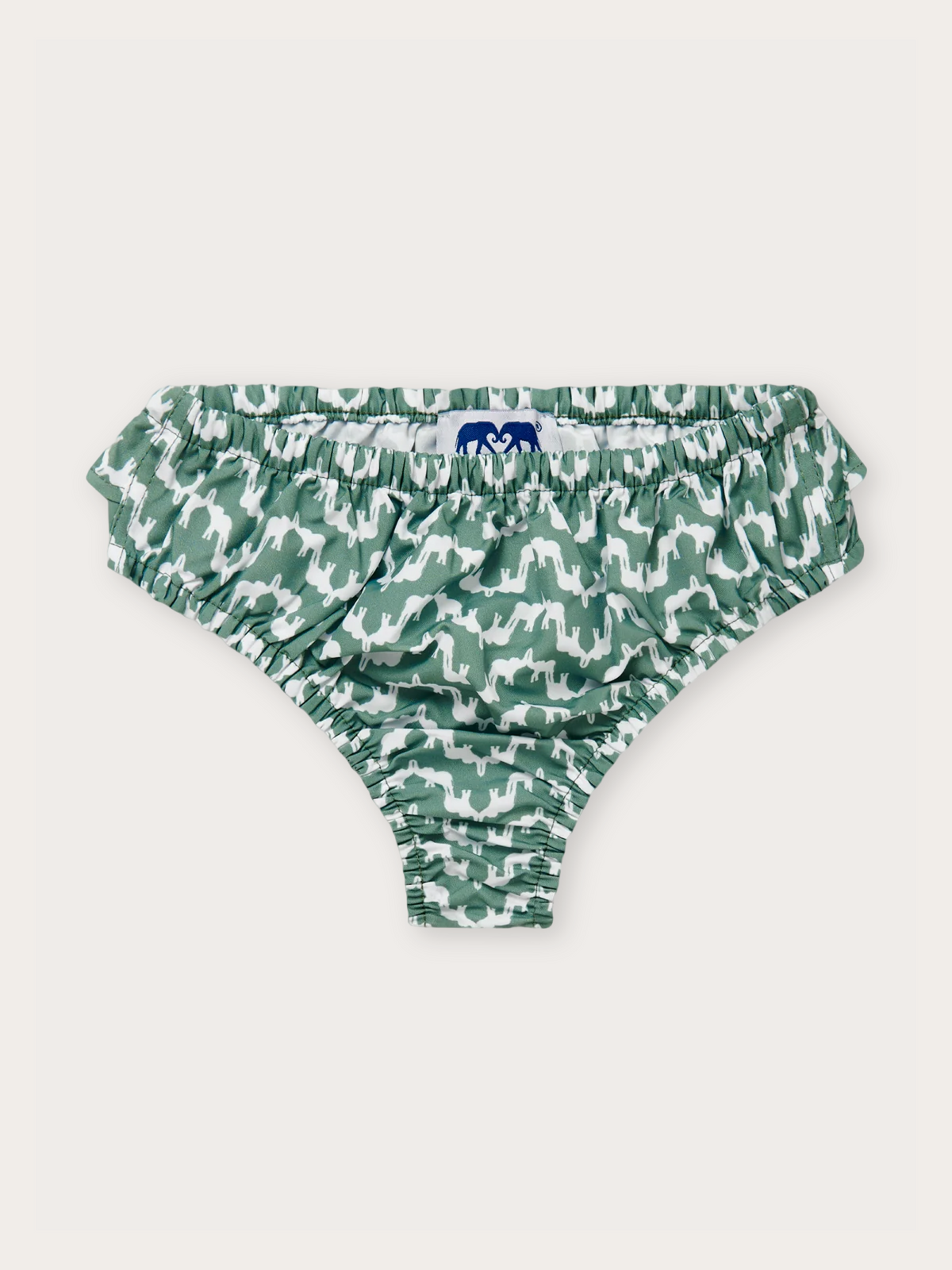 Green and white elephant print ruffled bikini shorts with an elastic waistband, photographed flat on a light beige background.