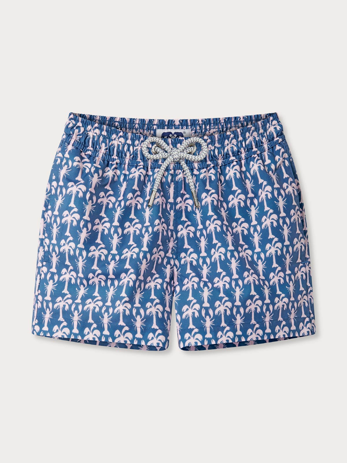 Blue swim shorts with lobster and palm tree pattern on a white background