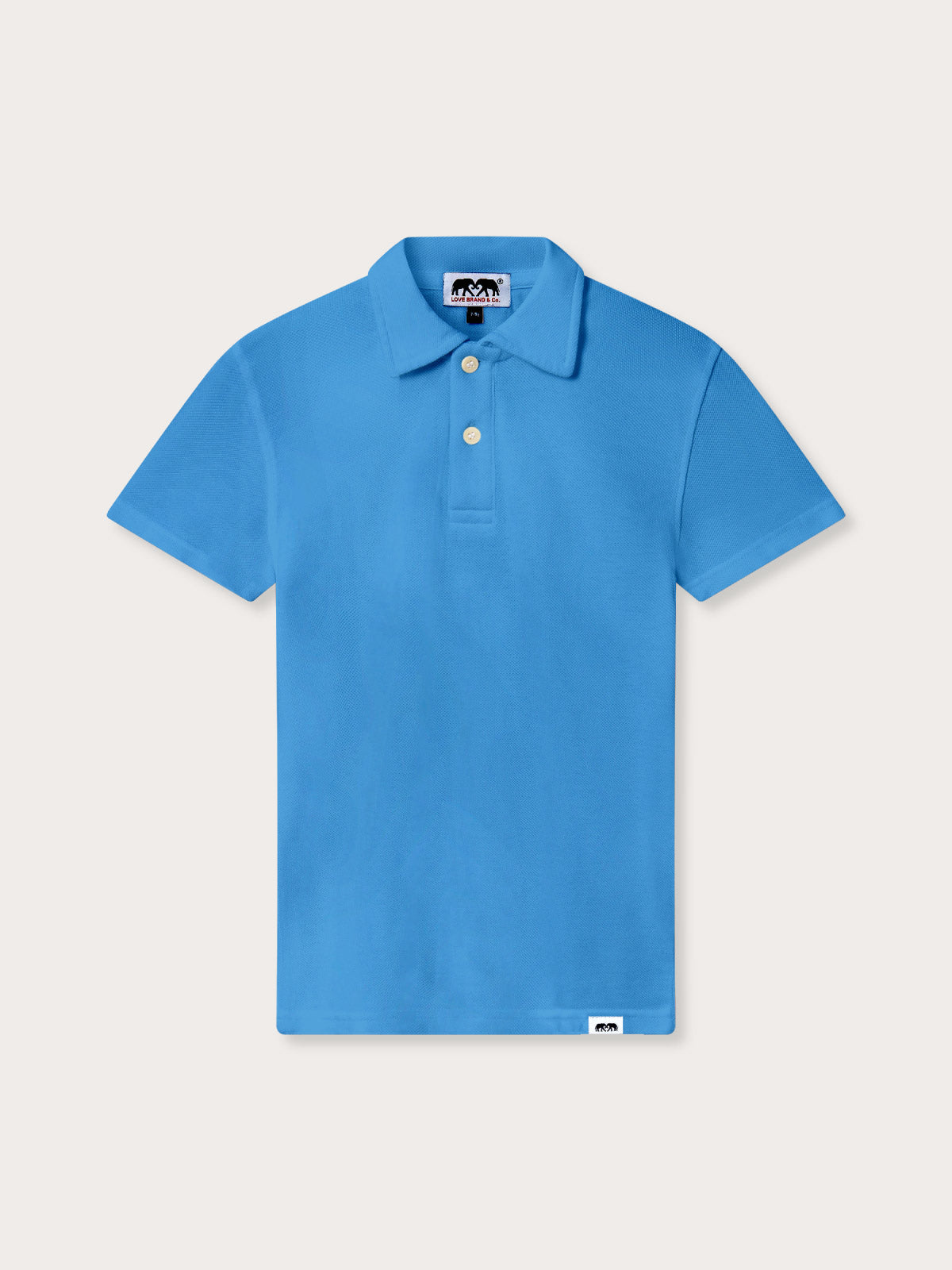 Blue polo shirt for kids on a light gray background.