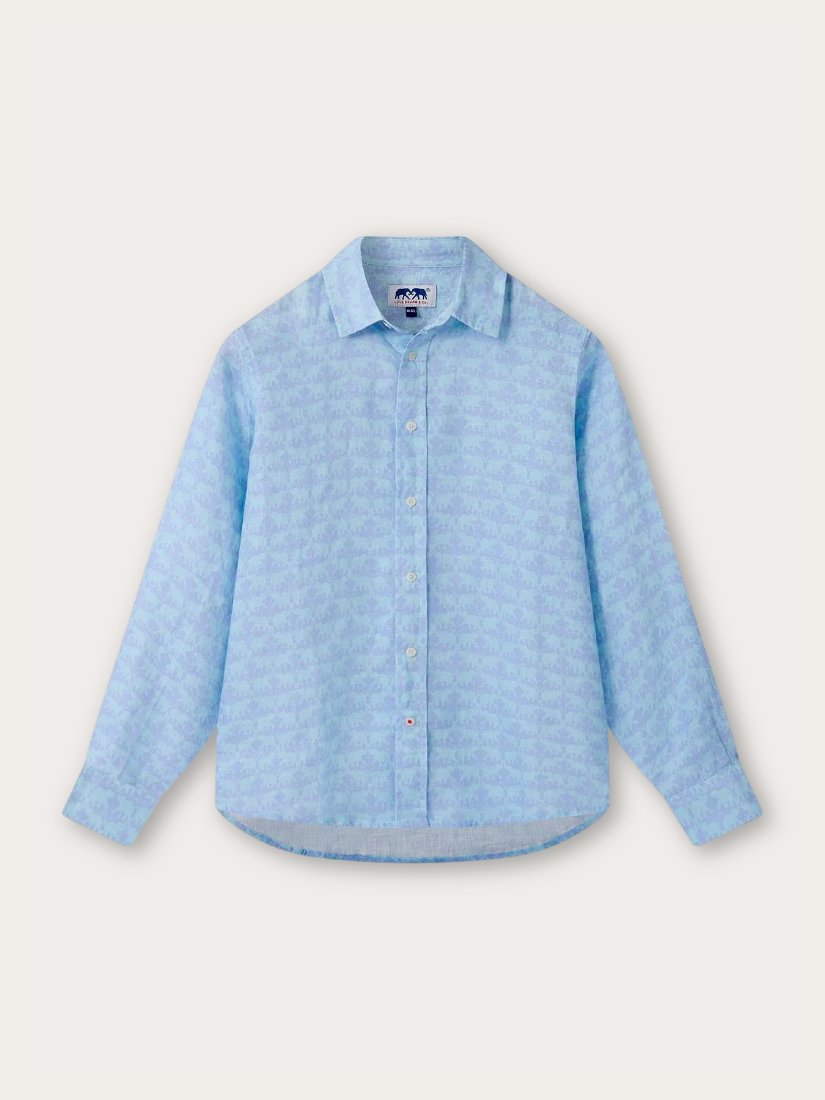 A light blue long-sleeve button-up shirt with a subtle repeating geometric pattern, displayed flat against a light beige background.