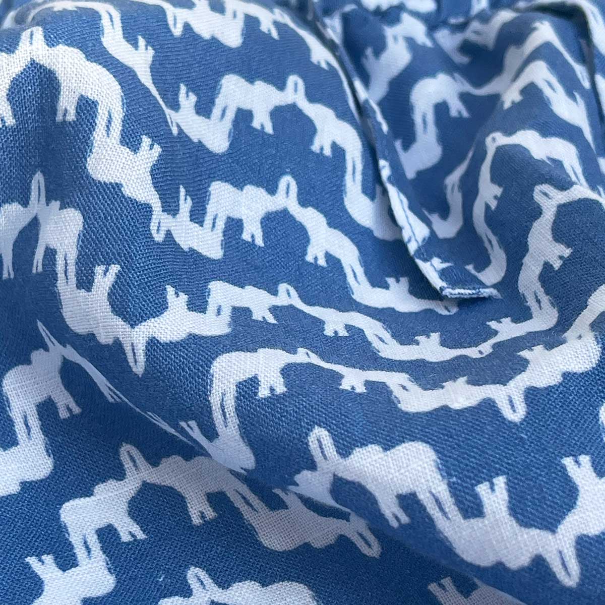 Boys Elephant Palace Blue Joulter Short featuring white elephant pattern on blue fabric.