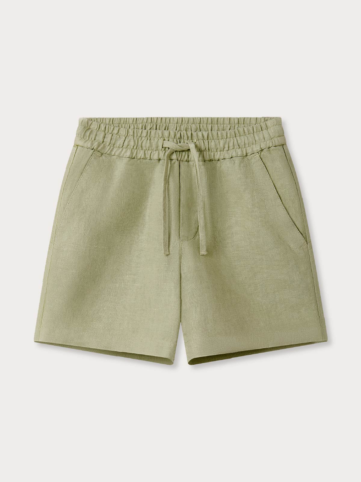 Front view of kids green linen shorts with a drawstring and 2 side pockets.