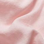 Detailed view of 100% linen fabric of Kids Pastel Pink Joulter Linen Shorts.