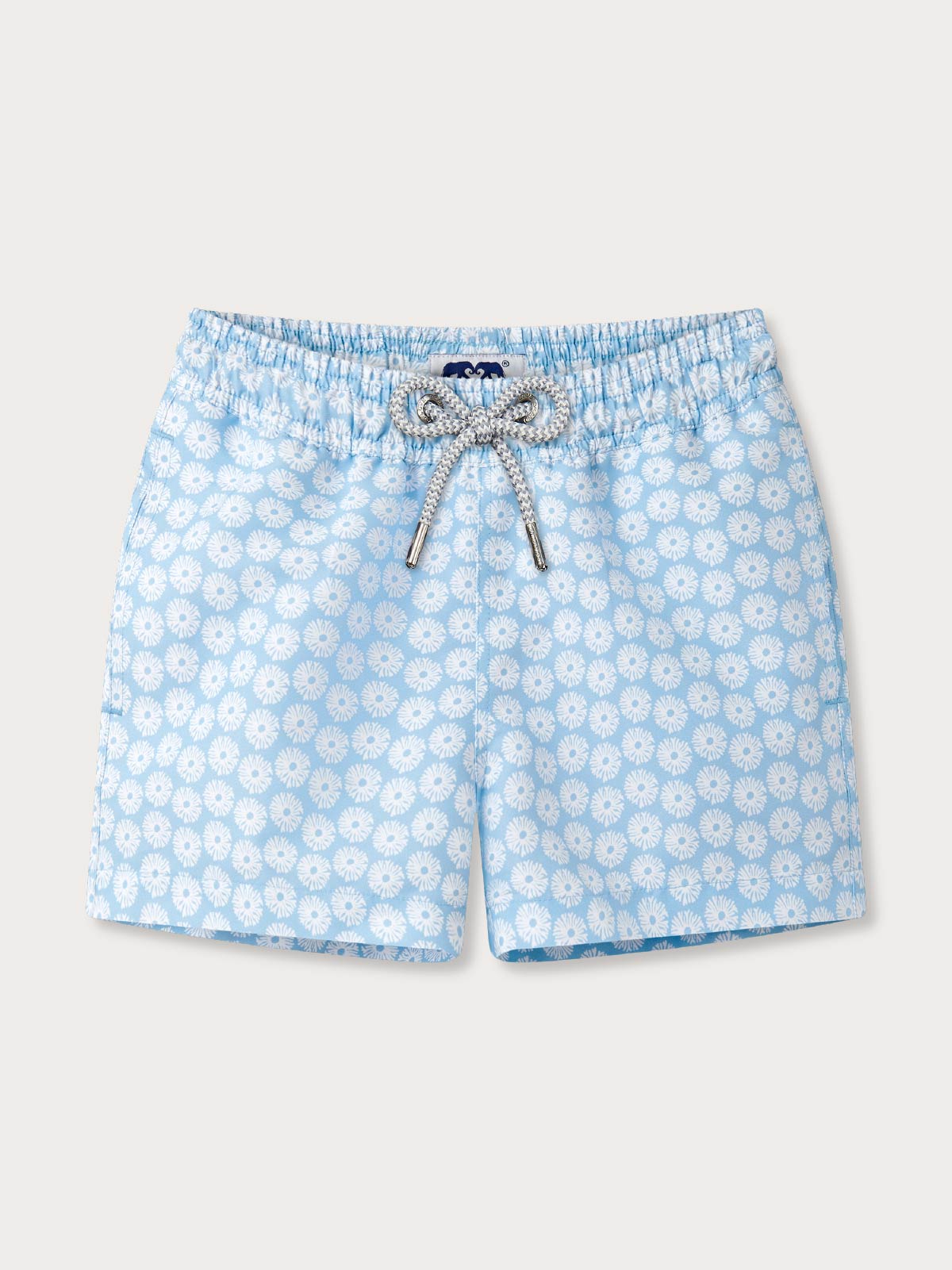 Blue coral patterned shorts with a bow detail on a light grey background