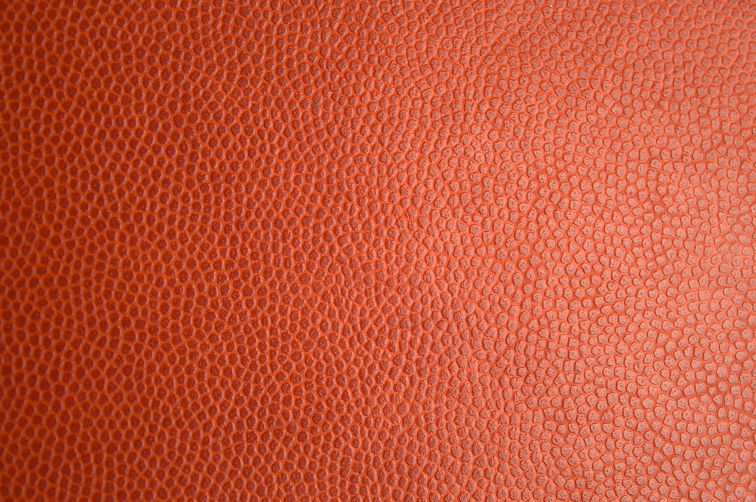 Close-up of orange leather texture