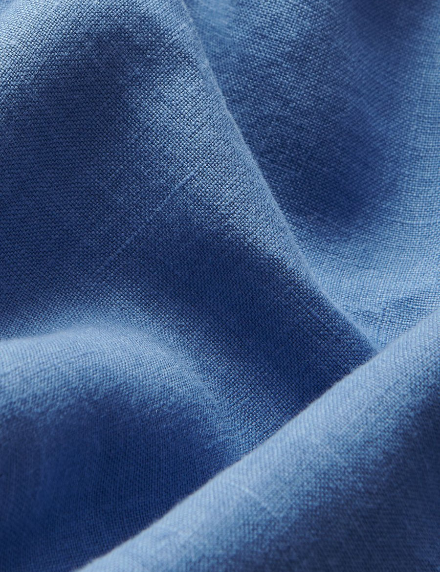 linen trousers men navyclose-up. Close up of the fabric used in Love Brand mens linen clothing.