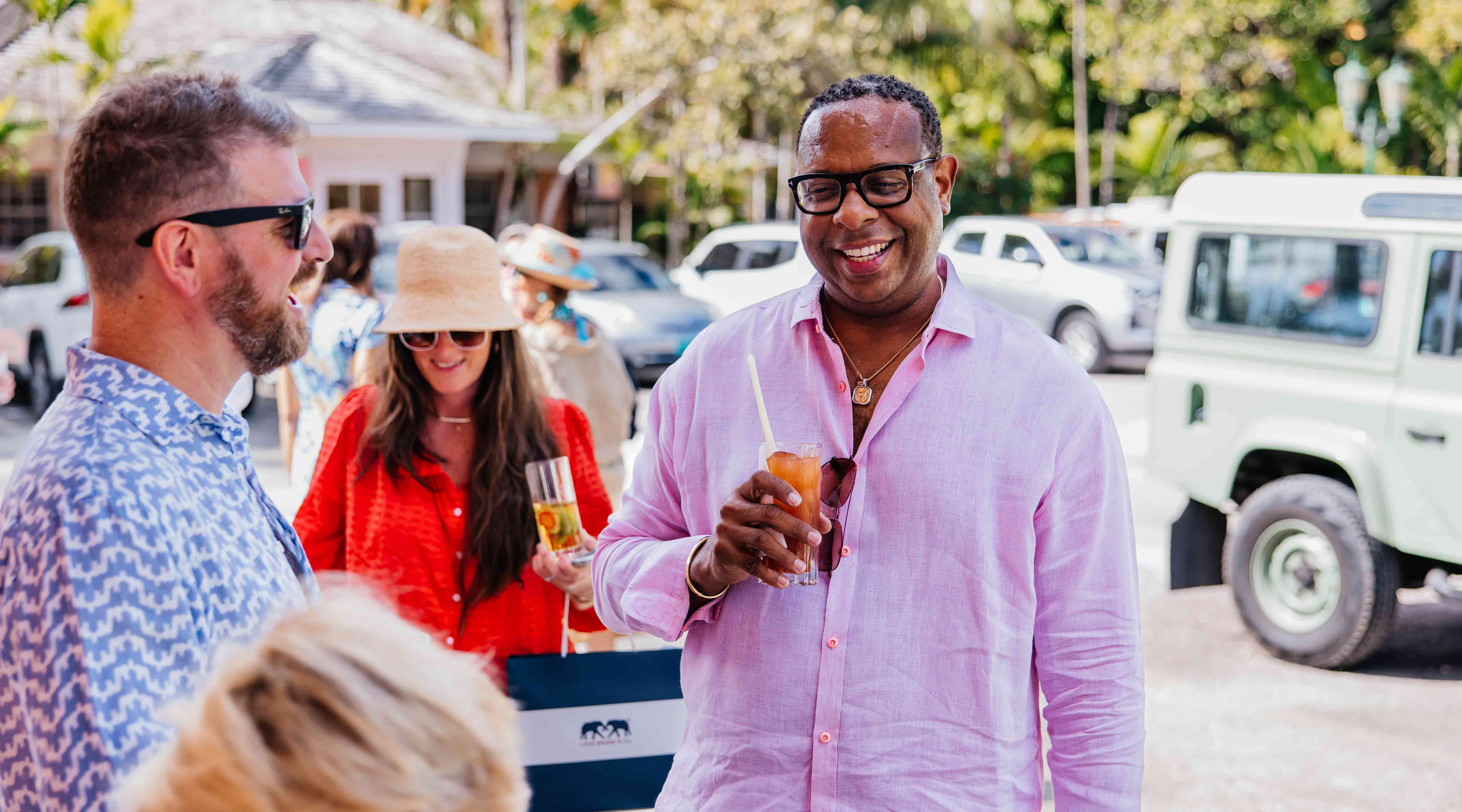 Guests enjoy cocktails at Love Brand's Bahama's store launch