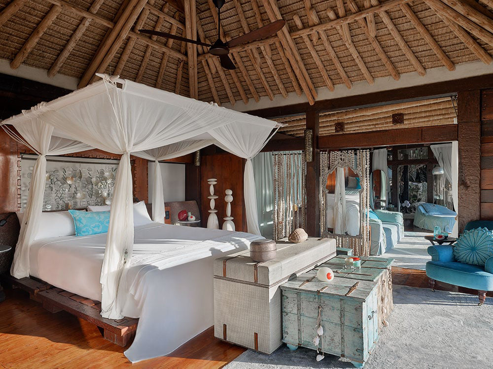 master bedroom inside a villa at North Island, Seychelles