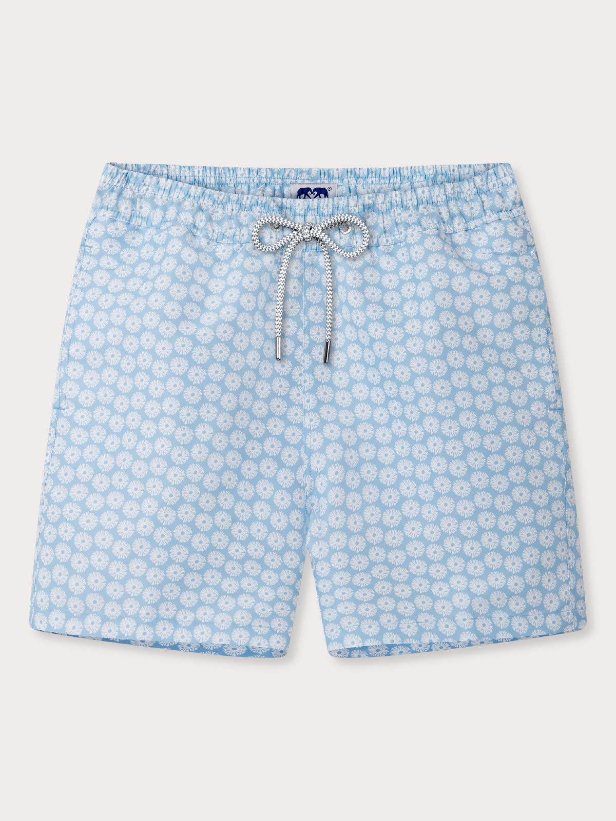 Blue floral patterned swimming shorts on a light grey background.